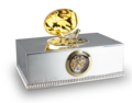 Contempary sterling silver, gold and diamond singing bird box with timepiece, by Reuge