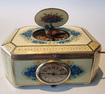 A very fine silver gilt and Imperial Yellow guilloche enamel singing bird box with timepiece, by C. A. Marguerat