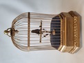 Antique single singing bird in cage, by Karl Griesbaum