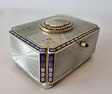 Silver gilt and full radial Guilloche enamel Singing bird box with original silver and enamel key and leather case