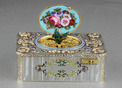 An exceptionally important and early silver, parcel-gilt, enamel and gilt appliques singing bird box, by Charles Bruguier