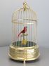 A small single singing bird-in-cage, by Karl Griesbaum