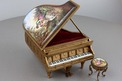 A fine Viennese gilt metal and signed pictorial enamel piano-form musical box and stool