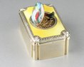 Silver gilt and enamel singing bird box with timepiece, by C. H. Marguerat