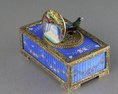 Sterling silver gilt, pictorial and enamel singing bird box with timepiece, movement by C. H. Marguerat