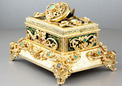 Vintage silver-gilt, enamelled, Emerald, red garnet and pearl-set singing bird box, by Karl Griesbaum