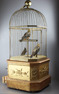 Antique coin-operated large double singing birds-in-cage, by Bontems