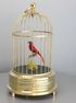 A small single singing bird-in-cage, by Karl Griesbaum