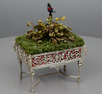 Antique silver plated intermittent-singing bird table jardiniere-on-stand, by Bontems