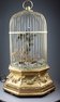 Antique Hexagonal-profile large single singing bird-in-cage, by Phallibois