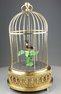 Small single singing bird-in-cage, by Karl Griesbaum