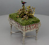 Antique silver plated intermittent-singing bird table jardiniere-on-stand, by Bontems