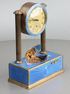 Vintage silver-gilt, guilloche and pictorial enamel timepiece alarm-actuated singing bird, by C. H. Marguerat