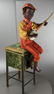 A very rare and fine antique black boy banjo player musical automaton, by Gustave Vichy