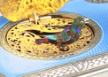 A very fine silver gilt and enamel singing bird box with timepiece, by C. H. Marguerat