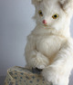 A vintage white cat ironing automaton, by Roullet & Decamps