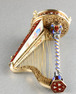 Gold, enamel and split seed pearl embellished musical harp with hidden scent bottle