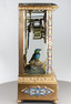 Rare antique gilt metal and champleve enamel timepiece-actuated singing bird, by Bontems