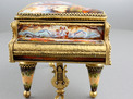 Vintage enamel and gilt metal grand piano musical box