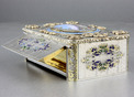 An exceptionally important and early silver, parcel-gilt, enamel and gilt appliques singing bird box, by Charles Bruguier