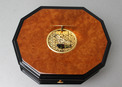 An exclusive and contempary decagonal singing bird card box, by Reuge