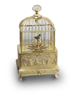 Vintage miniature gilt brass singing bird in cage, by Eschle