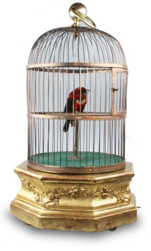 A large Antique hexagonal base antique single singing bird-in-cage, by Bontems