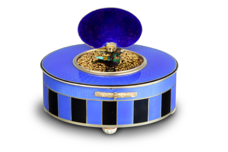 Silver-gilt and duet enamel oval singing bird box, by C. H. Marguerat