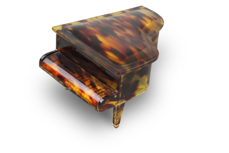 A vintage multi-tone faux tortoiseshell cased grand piano-form musical box