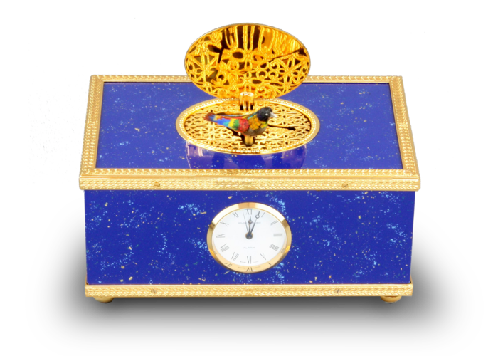 Lapis-lazuli enamelled and gilt musical timepiece alarm-actuated singing bird box, by Reuge