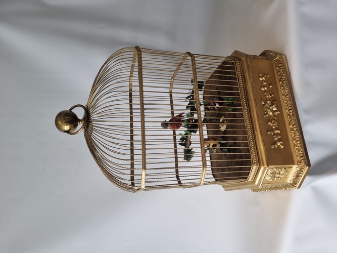 Large triple antique singing bird-in-cage, by Phallibois