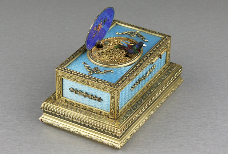 Powder blue guilloche and pictorial enamel singing bird box casket, by C. H. Marguerat