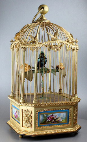 A stunning and very fine gilt bronze and Sevres plaque single singing bird-in-cage, by Bontems