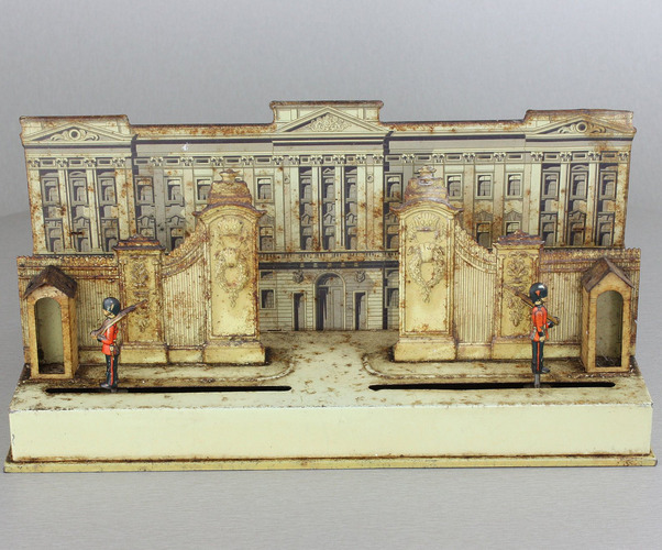 A small and unusual lithographed tinplate automaton  - 'The Changing of the Guard at Buckingham Palace'