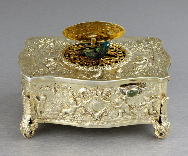 Vintage silver-gilt bow-front form singing bird box, by Karl Griesbaum