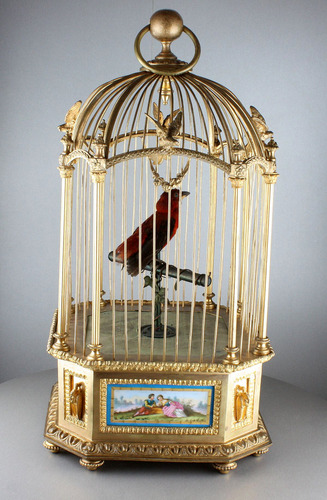 A stunning and very fine gilt bronze and Sevres plaque single singing bird-in-cage, by Bontems