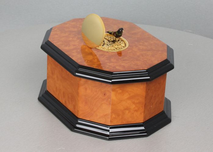 An exclusive and contempary decagonal singing bird card box, by Reuge