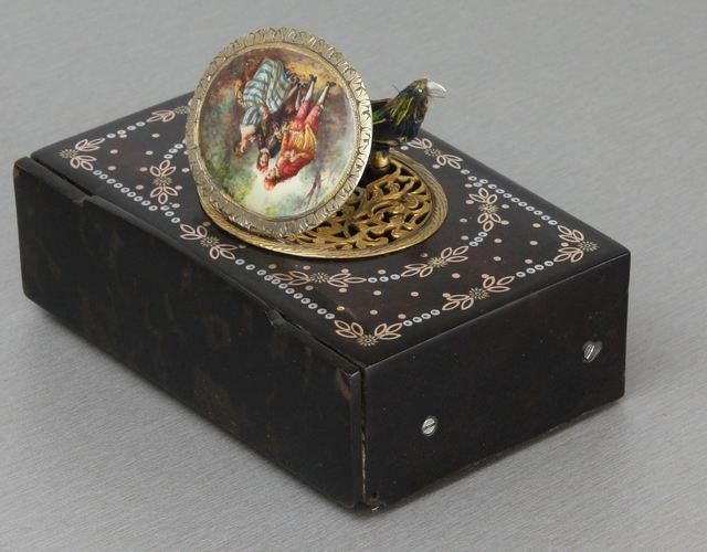 Antique inlaid mottled tortoiseshell and pictorial enamel singing bird box