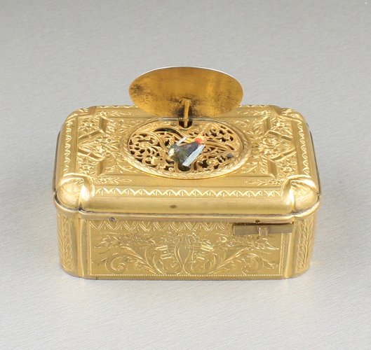 Antique Gilt metal singing bird box, by Raymy