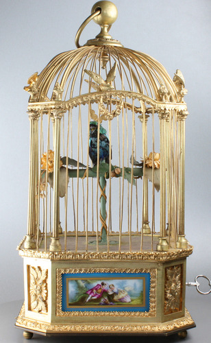 A stunning and very fine gilt bronze and Sevres plaque single singing bird-in-cage, by Bontems