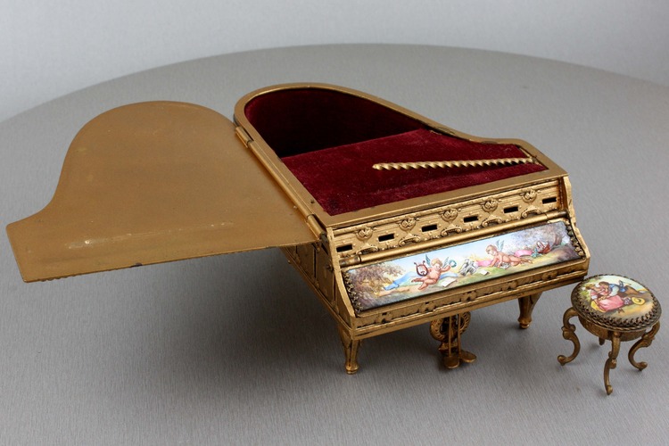 A fine Viennese gilt metal and signed pictorial enamel piano-form musical box and stool