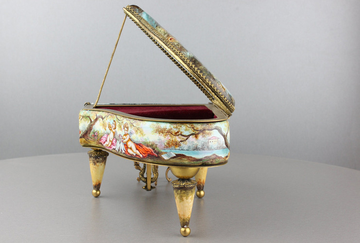 A large vintage Viennese enamel and gilt metal musical grand piano with chair