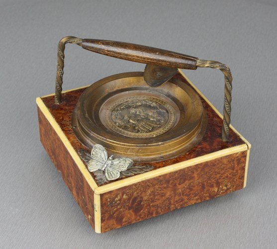 Vintage burr-yew and bone musical automaton ashtray, by Thorens