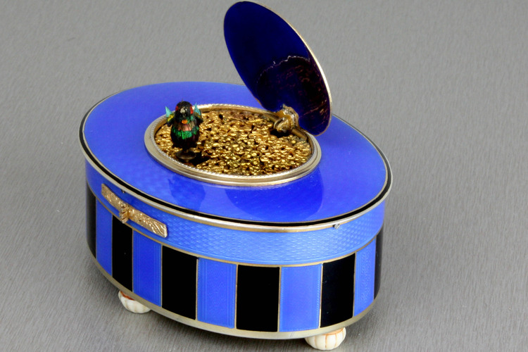 Silver-gilt and duet enamel oval singing bird box, by C. H. Marguerat