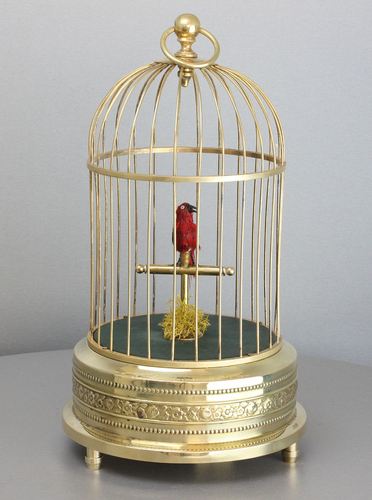 A small single singing bird-in-cage, by Karl Griesbaum