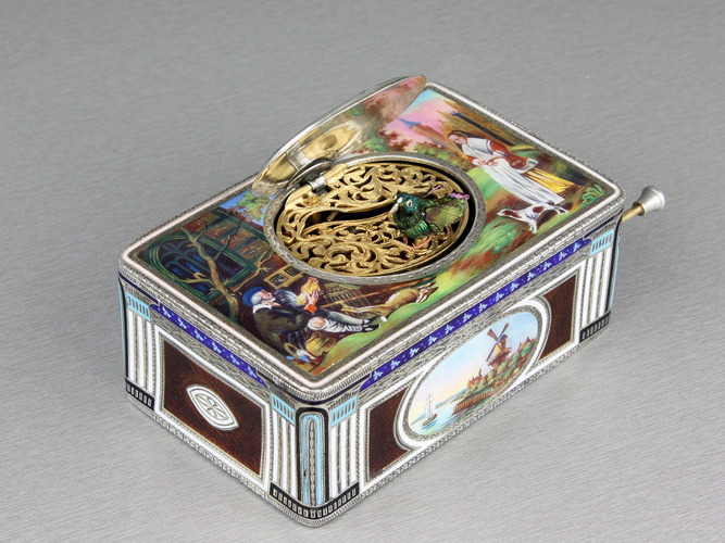 An exceptional silver and full pictorial enamel singing bird box, by Karl Griesbaum, Model 7, circa 1930