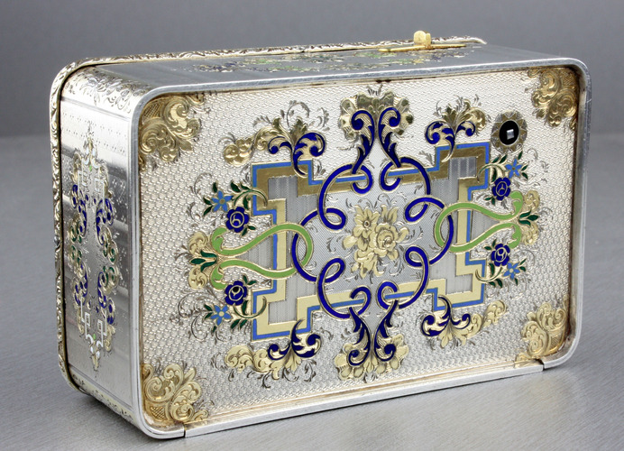 An exceptionally important and early silver, parcel-gilt, enamel and gilt appliques singing bird box, by Charles Bruguier