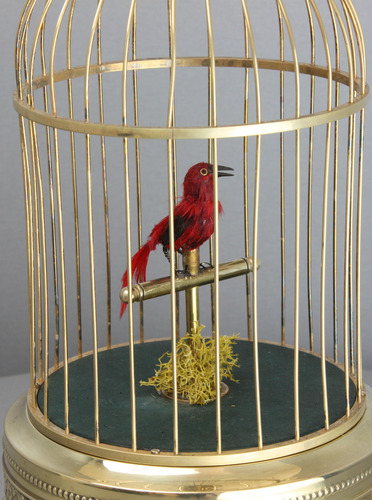 A small single singing bird-in-cage, by Karl Griesbaum