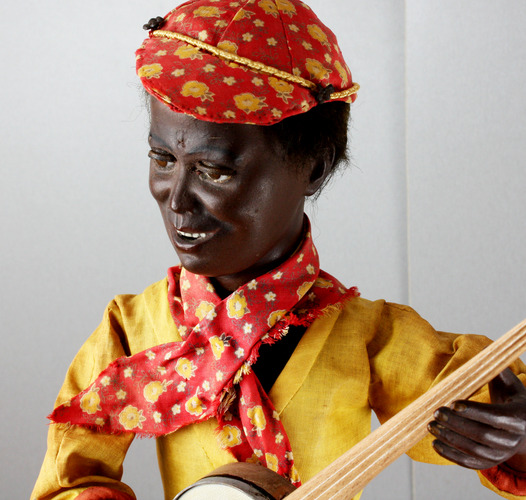 A very rare and fine antique black boy banjo player musical automaton, by Gustave Vichy