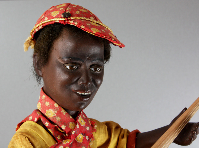 A very rare and fine antique black boy banjo player musical automaton, by Gustave Vichy